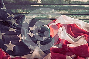 Patriotic symbols. American flag on an old wooden background