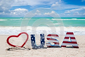 Patriotic USA background on the sandy beach photo