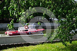 Patrol boat EMERCOM of Russia on duty on the river in the city