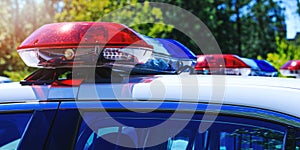 Patrol police car with beautiful emergency sirens lights. Canadian policemen in traffic control activity. A police raid for