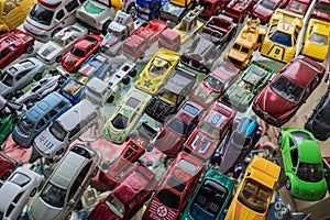 PATTATA THAILAND OCTOBER 4 : Many small toy cars colorful lined up on the beautiful glass on October 4, 2015. at Pattaya Chonburi