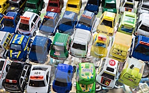 PATTATA THAILAND OCTOBER 4 : Many small toy cars colorful lined up on the beautiful glass on October 4, 2015. at Pattaya Chonburi