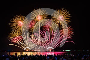 PATTAYA, CHONBURI, THAILAND Beautiful colorful fireworks night scene at Pattaya International Fireworks Festival and silhouette