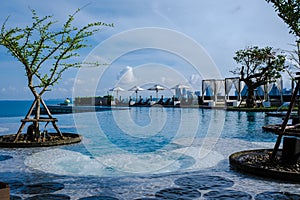 Pattaya Thailand, modern Hilton hotel at ocean front beach road Pattaya modern infinity pool