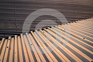 Pattern of the aluminium roofing during sunset.