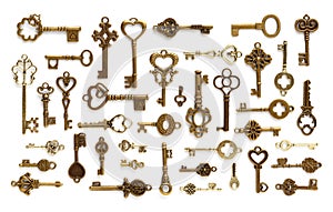 A pattern of antique, decorative, ornate keys. Isolated on a white