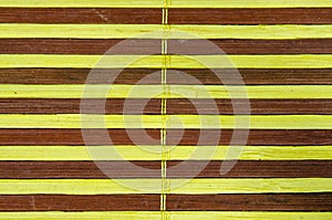 pattern of bamboo spokes which yellow and brown