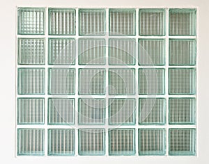 The pattern of block glass on the wall