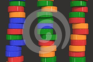 Pattern of blue, red and green cylinder tablets on black background