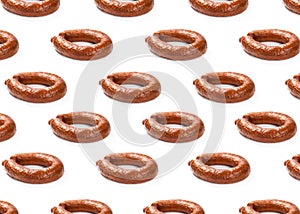 Pattern with boiled and smoked sausage on a white background