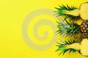 Pattern with bright pineapples on yellow background. Top View. Copy Space. Minimal style. Pop art design, creative