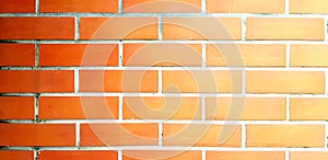 Pattern of brown, orange or yellow brick wall for background