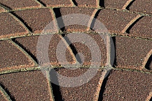 A pattern of brown stone pavement close, photo