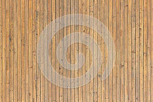 Pattern of brown wooden planks. Wood plank wall vertical background texture old panels. Brown background, backdrop and wallpaper.