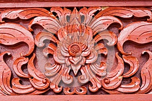 Pattern of carved on wood background on the wall of temple Thailand