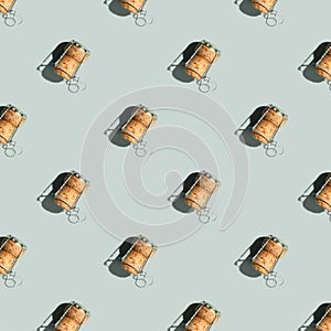 Pattern with champagne cork on blue background with shadow