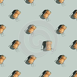 Pattern with champagne cork on blue background with shadow