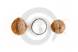 Pattern with coconuts on white background. Tropical abstract background. Flat lay, top view.