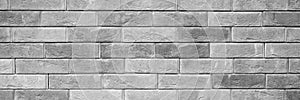 pattern of decorative gray slate stone wall surface as a background. tinted gray. banner.