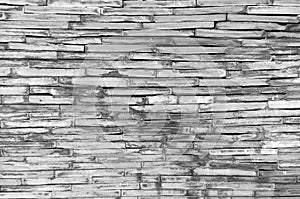 Pattern of decorative grey slate stone wall surface, background, texture