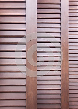 Pattern and detail of wooden louver doors.