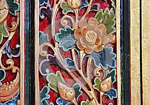 Pattern of flower carved on wood background. hand made in asia