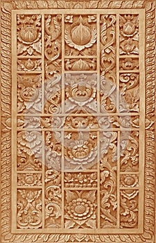 The Pattern of flower carved on wood background on the wall of templ