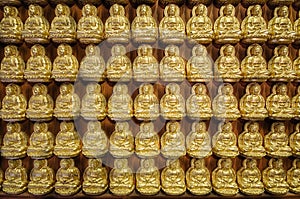 Pattern of golden Chinese Buddha in Thailand