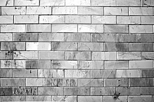 pattern gray color of modern style design decorative uneven cracked real stone wall surface with cement.