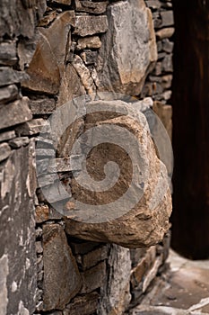 pattern gray color of modern style design decorative uneven cracked real stone wall surface with cement.Stone wall for background