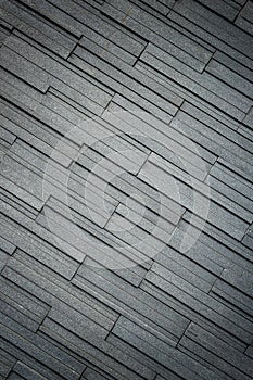 Pattern of grey and rough granite wall texture, background