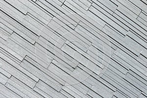 Pattern of grey and rough granite wall texture, background