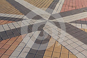 Pattern of inlaid colored paving slabs