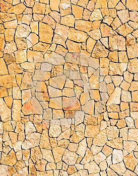 Pattern of light brown nature stone wall background texture