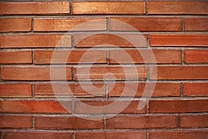 Pattern of long red bricks wall background