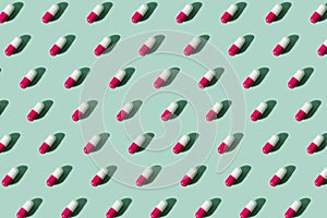 Pattern made with medicine pills on bright. Medicine and pharmacy creative concepts