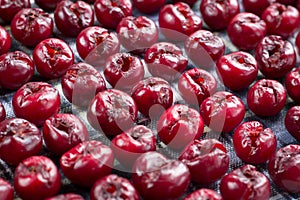 Pattern of mellow cherries prepared for  sun drying for conservation