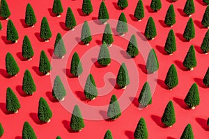 Pattern of miniature-pine trees on a red-background.