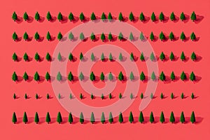 Pattern of miniature-pine trees on a red-background.