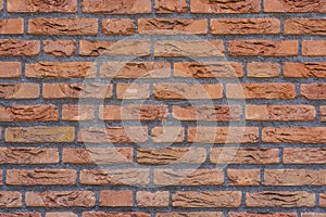 Pattern of a new modern orange brick wall, architecture background