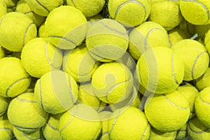 pattern of new tennis balls for background. Lots of vibrant tennis balls