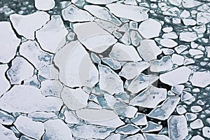 Pattern of pack ice floes on winter ocean surface