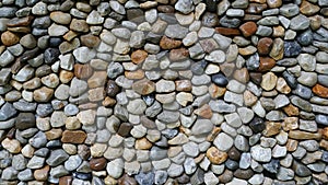 Pattern of pebble stone concrete wall, Surface rough of gravel decorative, Texture wallpaper background.