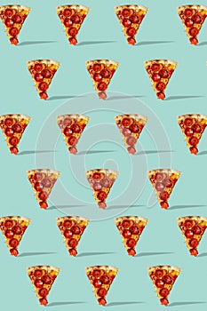 Pattern with a piece of pepperoni pizza on a blue background. Pizza slice poster