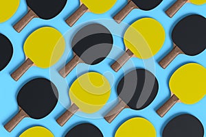 Pattern from ping pong rackets for table tennis on blue background