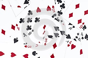 Pattern, playing cards of different suits as a background or backdrop, casino card games or poker