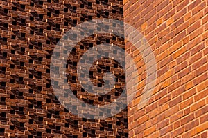 Pattern of red bricks on a wall..