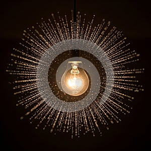 Pattern that simulates a dynamic, sunburst effect against a dark