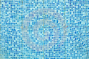 pattern of small blue and white tiles in harmonic structure like a swimming pool ground photo