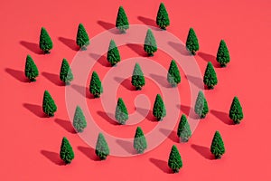 Pattern of miniature-pine trees on a red-background.